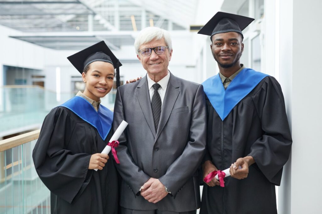 students-posing-with-profession-at-graduation-ceremony.jpg